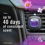 Febreze vent clip attached to a car air vent with text claiming up to 40 days of consistent scent and purple floral accents