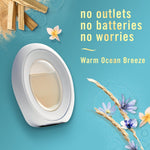 Close-up of Febreze oval air freshener device with copy reading no outlets no batteries no worries and Warm Ocean Breeze