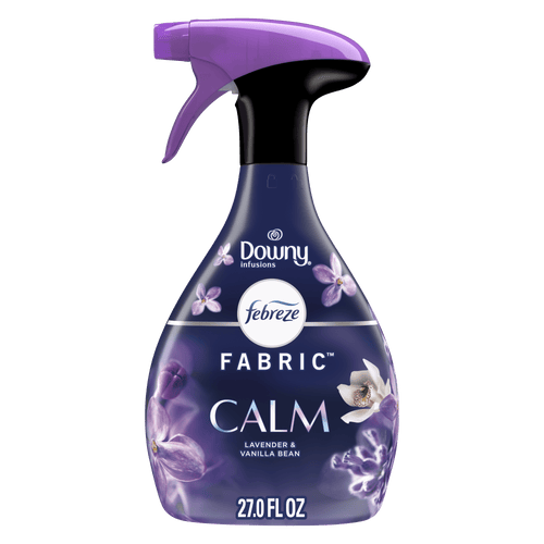 Bottle of Febreze Fabric Calm (Downy infusions) spray with purple trigger and floral label on white background