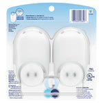 Rear view of Febreze Plug dual white warmers in clear blister packaging showing prongs, barcode, and product information