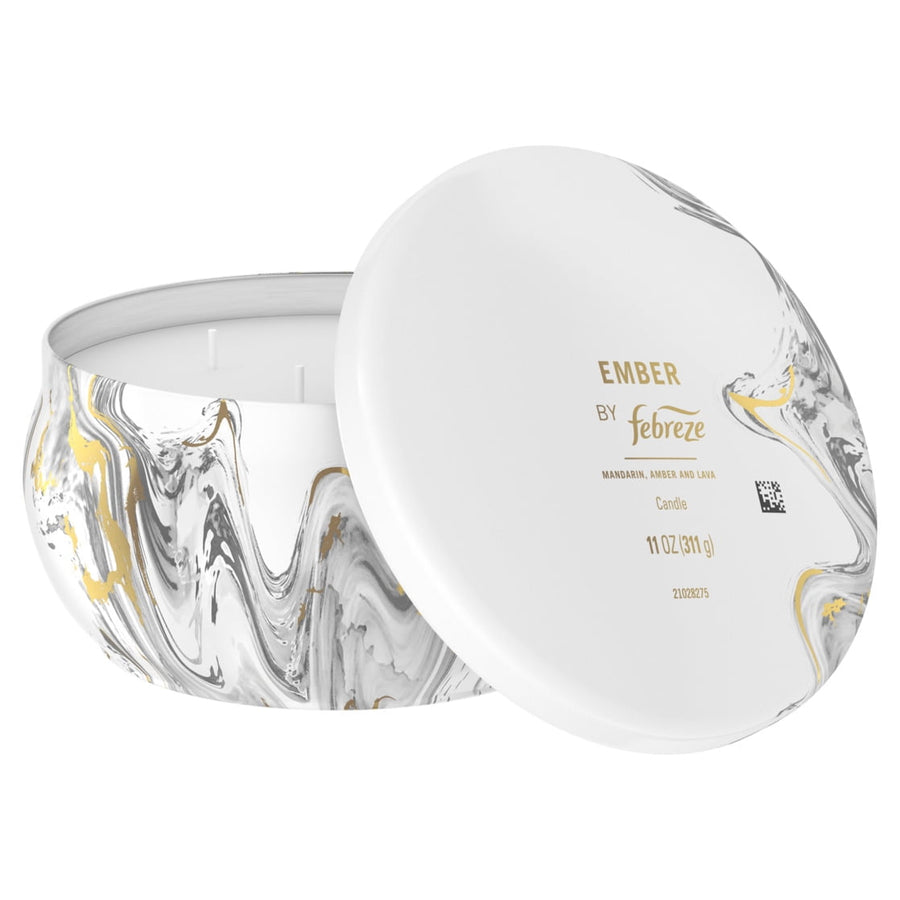 Febreze Ember candle with lid angled to show product label and marbled tin design on white background