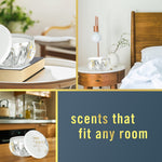 Collage of room scenes featuring the Febreze Ember marbled tin candle styled on nightstand and table