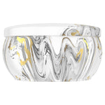 Side view of Febreze Ember marble-pattern tin candle with white lid resting on top, showing curved profile