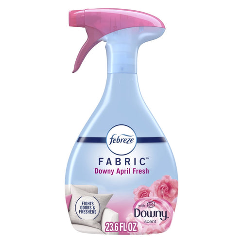 Spray bottle of Febreze FABRIC Downy April Fresh with pink trigger and floral label on white background.