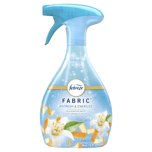 Close-up of a Febreze Fabric spray bottle labeled Refresh & Energize with floral and orange peel graphics
