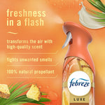 Orange promotional graphic showing Febreze Luxe spray can and text listing features like fights unwanted smells and 100% natural propellant