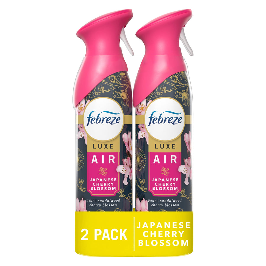 Two Febreze Luxe Air Japanese Cherry Blossom spray bottles with pink nozzles shown side by side in retail pack.