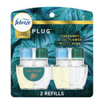 Febreze Luxe Plug refill twin pack on teal rainforest-themed backing showing two clear oil refill bottles and '2 refills' text.