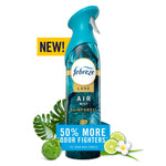 Tall teal Febreze Luxe Air Mist bottle labeled Rainforest with tropical leaves and a 50% more odor fighters badge