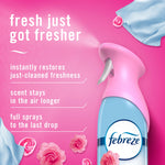 Pink background ad showing Febreze spray nozzle and petals with text promoting fresher scent and lasting fragrance