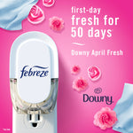 Febreze plug-in shown on pink background with copy stating first-day fresh for 50 days and Downy logo