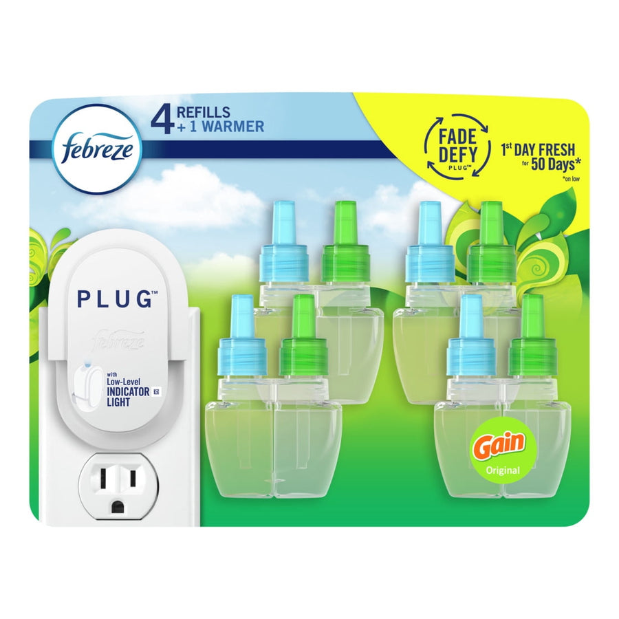 Febreze Plug air freshener starter unit shown with five clear Gain-scented refill bottles against green packaging background.