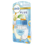 Angled view of Febreze Plug refill blister pack displaying twin clear oil cartridges and blue-themed packaging art