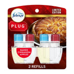 Retail blister pack showing two Febreze Plug oil refill bottles labeled Baked Cinnamon Apples with pastry image