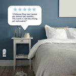 Bedroom scene with plugged-in Febreze air freshener and a review bubble praising the product