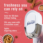 Close-up of a Febreze plug-in device on a pink background with text about freshness and small cinnamon and apple visuals