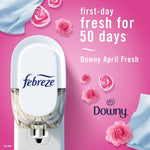 Close-up promo image of a Febreze plug-in in an outlet with pink roses and text claiming first-day fresh for 50 days