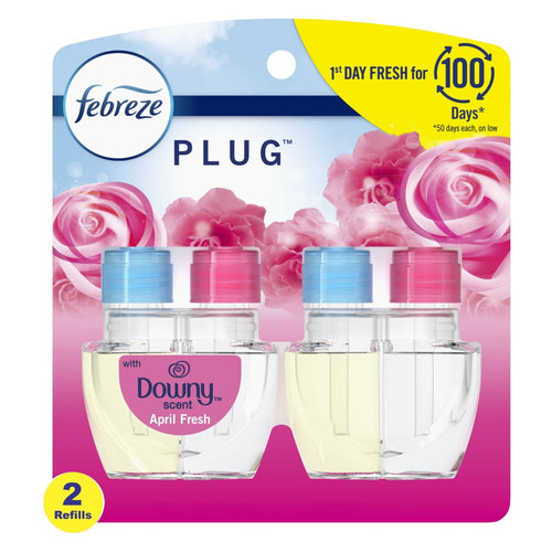 Front retail blister pack showing two Febreze Plug oil refills with Downy April Fresh branding and floral background