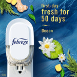 Febreze plug-in device on a blue background with 'fresh for 50 days' and water lily imagery