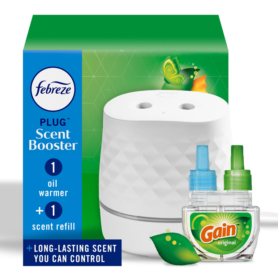 Product box showing Febreze Plug Scent Booster starter kit with white plug warmer and Gain scent refill on green background.