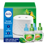 White Febreze Plug Scent Booster oil warmer shown with three Gain refill bottles and green packaging behind on a white background.