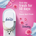Close-up of Febreze plug-in device on pink background with 'first-day fresh for 50 days' and Downy branding