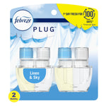 Packaged Febreze Plug air freshener refill twin pack labeled Linen & Sky with clear refill bottles and blue accents.