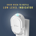 Febreze plug warmer shown in outlet with glowing blue low-level indicator and text 'Know when to refill Low Level Indicator'