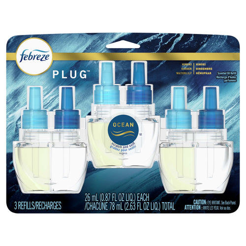 Retail blister pack showing three Febreze Plug refill bottles labeled Ocean with blue background