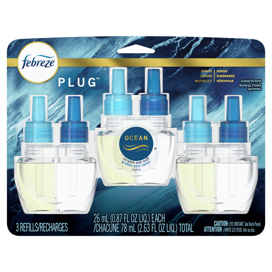 Retail blister pack showing three Febreze Plug refill bottles labeled Ocean with blue background