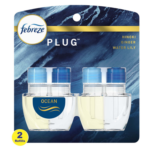Front-facing Febreze Plug scented oil refill blister pack labeled Ocean showing two refill bottles against a blue marbled backing