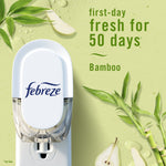 Febreze plug-in device on a pale green background with bamboo accents and text claiming 'first-day fresh for 50 days' Bamboo.