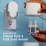 Hands holding the top of a Febreze Plug Scent Booster and a refill bottle next to a plugged Febreze unit to show compatibility