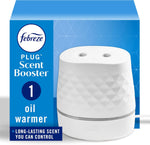 White Febreze Plug Scent Booster oil warmer shown against blue product packaging with brand logo visible