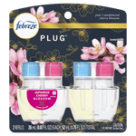 Febreze Plug scented oil refill pack showing four clear refill bottles with pink and blue caps and floral packaging art