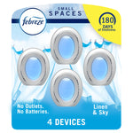 Febreze Small Spaces blister pack showing four oval air freshener devices with blue centers and linen background