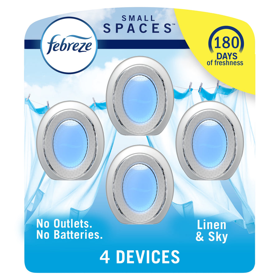Febreze Small Spaces blister pack showing four oval air freshener devices with blue centers and linen background