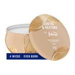 Beige Febreze Soothe & Restore candle tin with lid leaning against bowl, banner reading “4 WICKS • EVEN BURN”