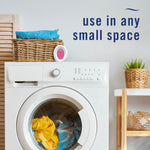 Laundry room scene with an oval Febreze device on top of a washing machine and text 'use in any small space'