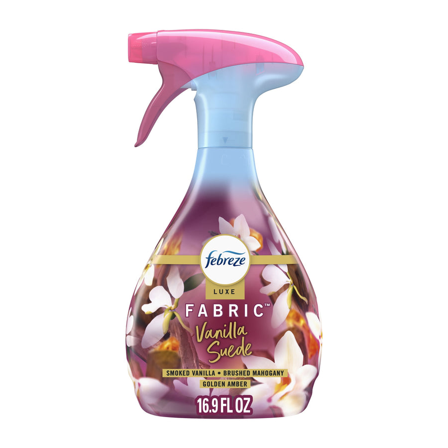 Febreze Luxe Fabric Vanilla Suede spray bottle on white background with floral label and 16.9 FL OZ text.