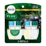 Febreze Plug refill twin pack on green packaging labeled White Pine & Juniper Berry, two clear oil refill bottles visible