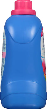 Side view of a blue Final Touch bottle showing the curved profile, seam down the center and a pink cap at the top.