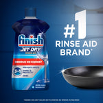 Finish Jet‑Dry bottle pictured beside a black frying pan with large '#1 RINSE AID BRAND' text on blue background.