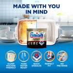 Finish Ultimate Quantum pouch in front of a side-by-side dish image showing before and after cleaning with icons below