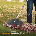Fiskars leaf rake being used on lawn with callouts highlighting extra-long handle, teardrop shaft and curved tines