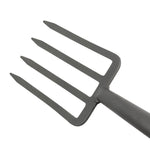 Detail close-up of the four flat metal tines and neck of a Fiskars pitchfork on a white background.