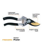 Product diagram of Fiskars titanium pruner with callouts for lightweight handles and angled cutting head.