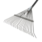 Angled studio close-up of Fiskars metal tine leaf rake head and black handle on white background.