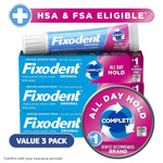 Three Fixodent Original denture adhesive boxes with a tube on top, 'HSA & FSA Eligible' banner and a prominent 'All Day Hold' badge.