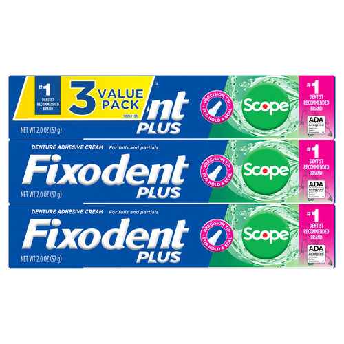 Flat product photo of three Fixodent Plus Scope denture adhesive cream boxes stacked horizontally showing packaging art